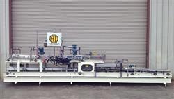 Image HARTNESS 825 Case-Tray Bottle Packer  - 1 from Bid-on-Equipment.com