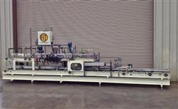 Image HARTNESS 825 Case-Tray Bottle Packer  - 2 from Bid-on-Equipment.com