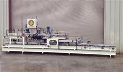 Image HARTNESS 825 Case-Tray Bottle Packer  - 3 from Bid-on-Equipment.com