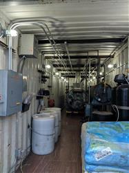 Image Portable High Pressure Steam Boiler in a 40ft Shipping Container - 11 from Bid-on-Equipment.com
