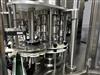 Image FILLBER VOL 32-8 Rotary Volumetric Piston Dosing Bottle Filler Capper for 2 oz. Energy Drink  - 8 from Bid-on-Equipment.com