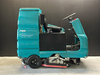 Image TENNANT 7100 Ride On Floor Scrubber - New Battery - 1 from Bid-on-Equipment.com