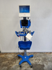 Image GE Dinamap V100 and SmartLinx 2 Monitors with Rolling Stand Cart and Basket - 1 from Bid-on-Equipment.com
